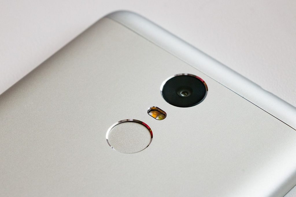 Self-Custody Hardware Gets Simpler Setup Routines unlocking a phone with a fingerprint